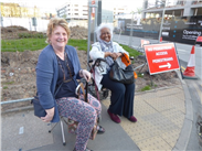 Joan & her friend waiting in Manchester for their lift home, after a rewarding day in Cheshire with the FOWs.